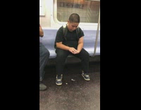 Subway boy playing with putty gum train black clothes backpack