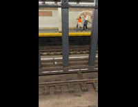 Collab WINY - Three guys carry curved sofa in train station