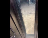 Filmer got stuck in elevator doors keeps closing