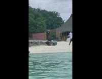 pt 2 man in open white button down beach selfies