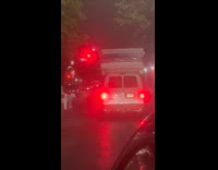 Collab WINY - Van with stack of mattress on roof