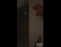 Person play vinyl disc kitchen lights flicker