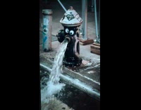 Broken fire hydrant with googly eyes sticker