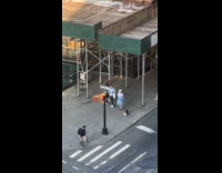 Collab WINY - Woman dances with little girl on sidewalk