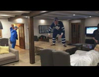 Guy slides onto table knocks friend off feet 