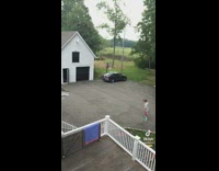 Guy makes coke bottle trick shop off of roof of house 
