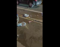 Pink Dildo Lays Near Bikes and Sidewalk 