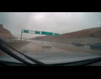 Filmer drives and drifts on slippery highway
