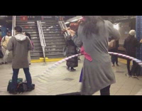 Collab Subway Creatures - woman plays violin and hula hoops