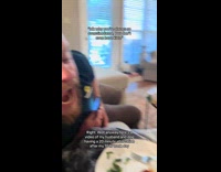 Man teasing growling dog 