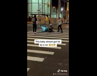 Guy wearing baby costume falls out stroller 