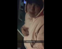 Guy plays air guitar by pool table 