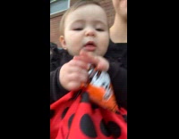 Little girl gets excited and grabs snack