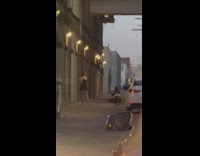 Girl black dress pose on street cars