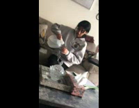 Girl pours water spills wash your hands 