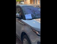 Car parked on street left with passive aggressive note