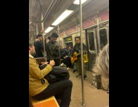 Man sings with his guitar inside train while travel 