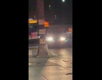 Man climbs on front of bus to try to prevent bus from leaving