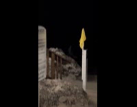 Man sees strange figure sitting on rocks at beach