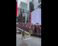 Dancers perform flash mob choreography on stairs 