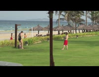 Black bathing suit lady poses shower beach 