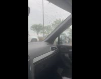 Cars reroute opposite direction because of flood