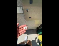 Woman filming and fails catching golf balls 