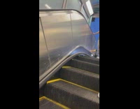 Man tries to go down upward escalator 