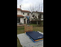 Kid jumps wood pallet blue mat scorpion 