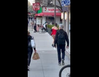 Man Runs Toward ATM in Red Tank Top and Panties 