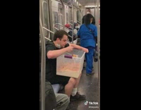 Guy drops tub of cereal milk subway 