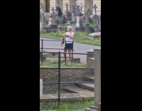 Woman blonde selfie cemetery grave shades lookalike