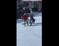 Two men jacket purple snowboard caught filmer 