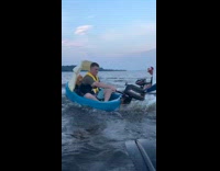 Collab Clips MPUGC - Guys driving small boats on lake