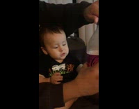 Baby excited with sound of soda opened