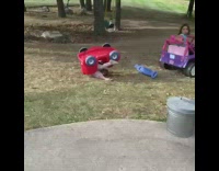 Girl drives electric car pulls toy car