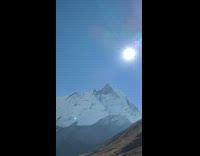 Collab PubityPets - Man Walks Behind Friend on Mountain Trail