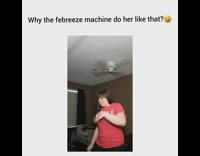 Girl dances to song in front of cell phone, Febreeze sprays her in the face