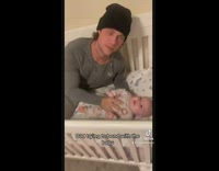 Dad tries to bond with his baby