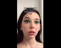 Collab BitchIG2 - Girl with green eyelid makeup staring 
