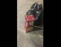 Red four loko fantasy football trophy thrown out on the side of the road