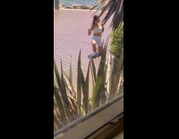 Yellow shirt white shorts girl one knee 