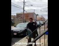 Guy sings while playing with plastic bag