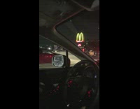 man running through freeway mcdonalds sign in back