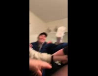 Guy jokingly chokeholds friend and fall through glass window from second story inside bathroom