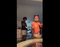 Baby girl gives great sassy dance moves 