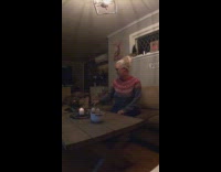 Lady lights candle which turns out to be sparkler