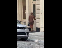 UPS delivery man wearing cowboy boots 