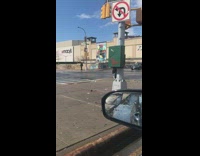 White jacket lady dances alone road median 