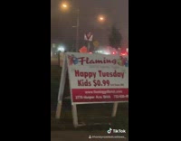 Flaming sign on road misspell 